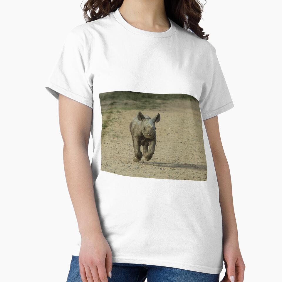 Rhino calf running by Conservation Art Emporium