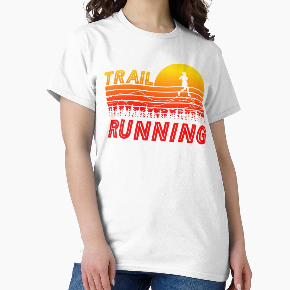 Trail running in orange sunset with mountains and forest by wejollydigitals