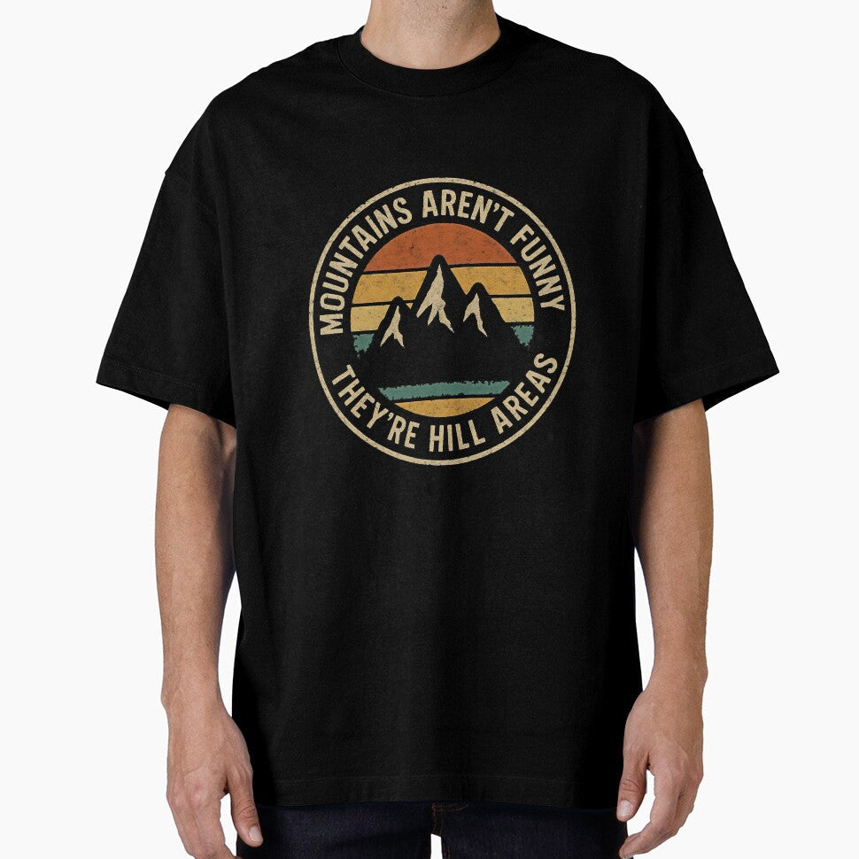 Mountains Aren’t Funny – They’re Hill Areas Pun by Punny Graves