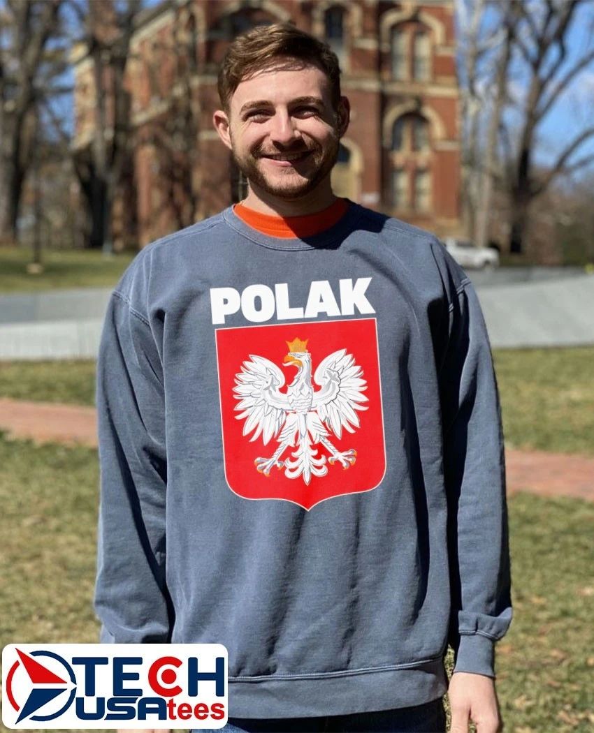 Otis wearing Polak logo shirt